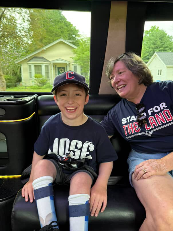 Young Guardians fan laughing on the way to the ballpark