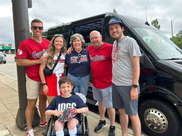 GSP group in front of the party bus